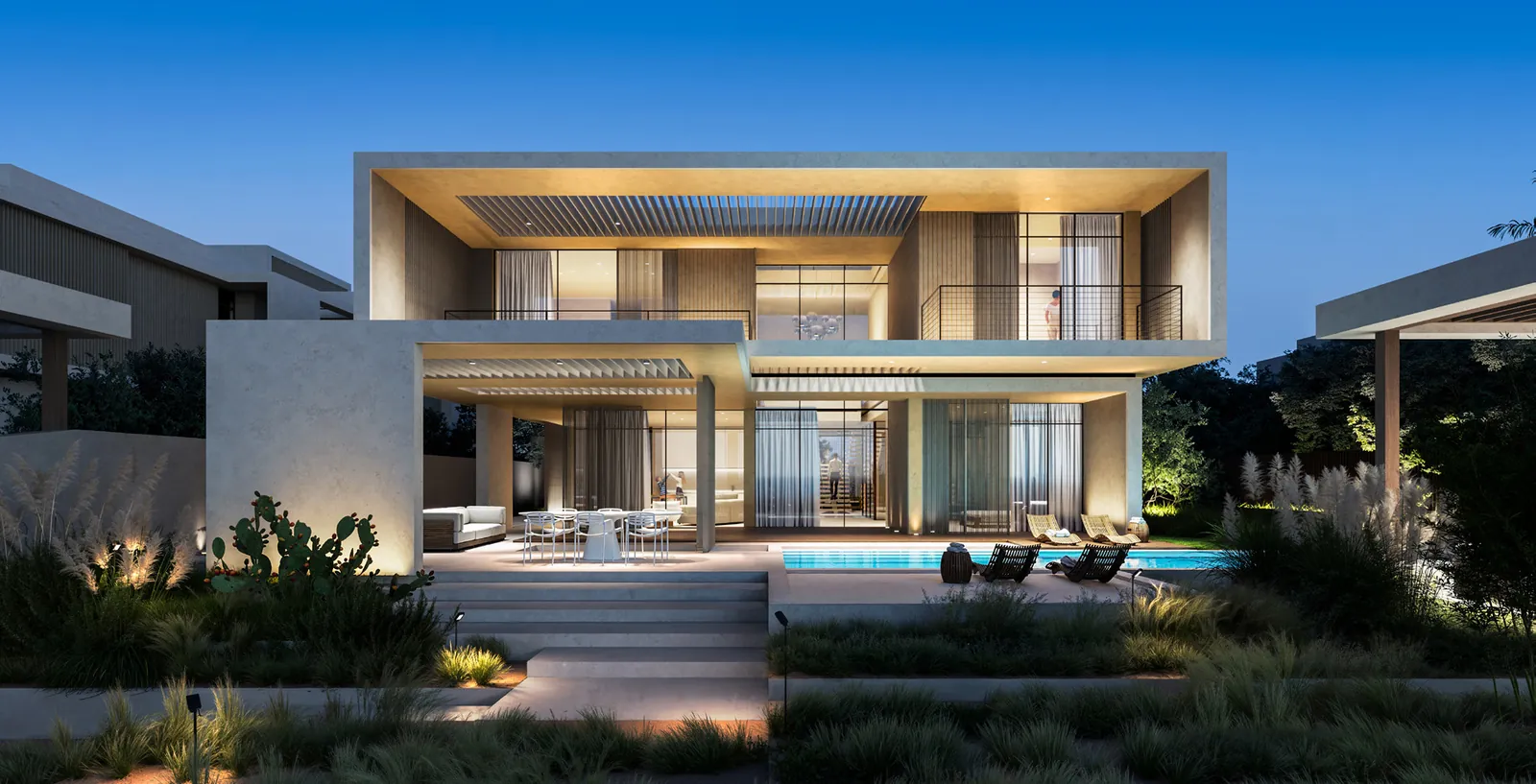 Canal villa at dusk with its pool terrace